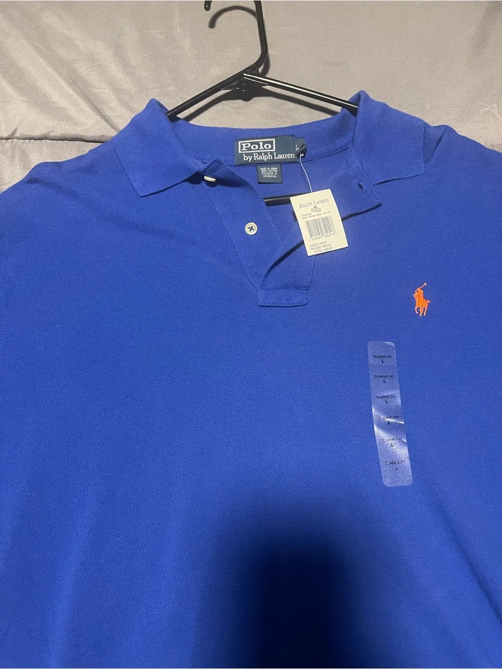 Ralph Lauren Men’s Polo Shirt in Bright Blue with Orange Logo